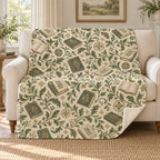Sage Endpapers blanket, on a sofa