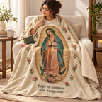 Bajo tu amparo
nos acogemos blanket, wrapped around a reader