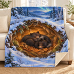 Cozy Bear Den blanket, on a sofa