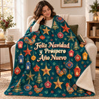 Feliz Navidad y Próspero Año Nuevo blanket, wrapped around a reader