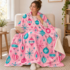 Atomic Ornaments blanket, wrapped around a reader