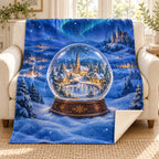 Village Snow Globe blanket, on a sofa