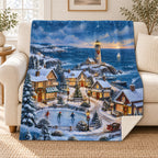 Snowy Lighthouse Village blanket, on a sofa