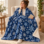 Navy Snowflakes blanket, wrapped around a reader
