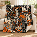 La Vida Sigue blanket, on a sofa