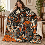La Vida Sigue blanket, wrapped around a reader