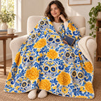 Talavera Calaveras blanket, wrapped around a reader