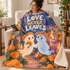 Love Never Leaves blanket, wrapped around a reader