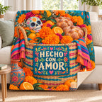 Hecho con Amor blanket, on a sofa