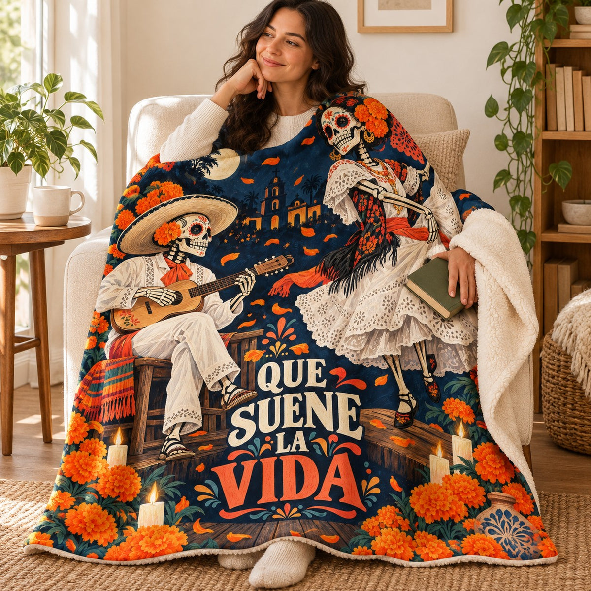 Que Suene la Vida blanket, wrapped around a reader