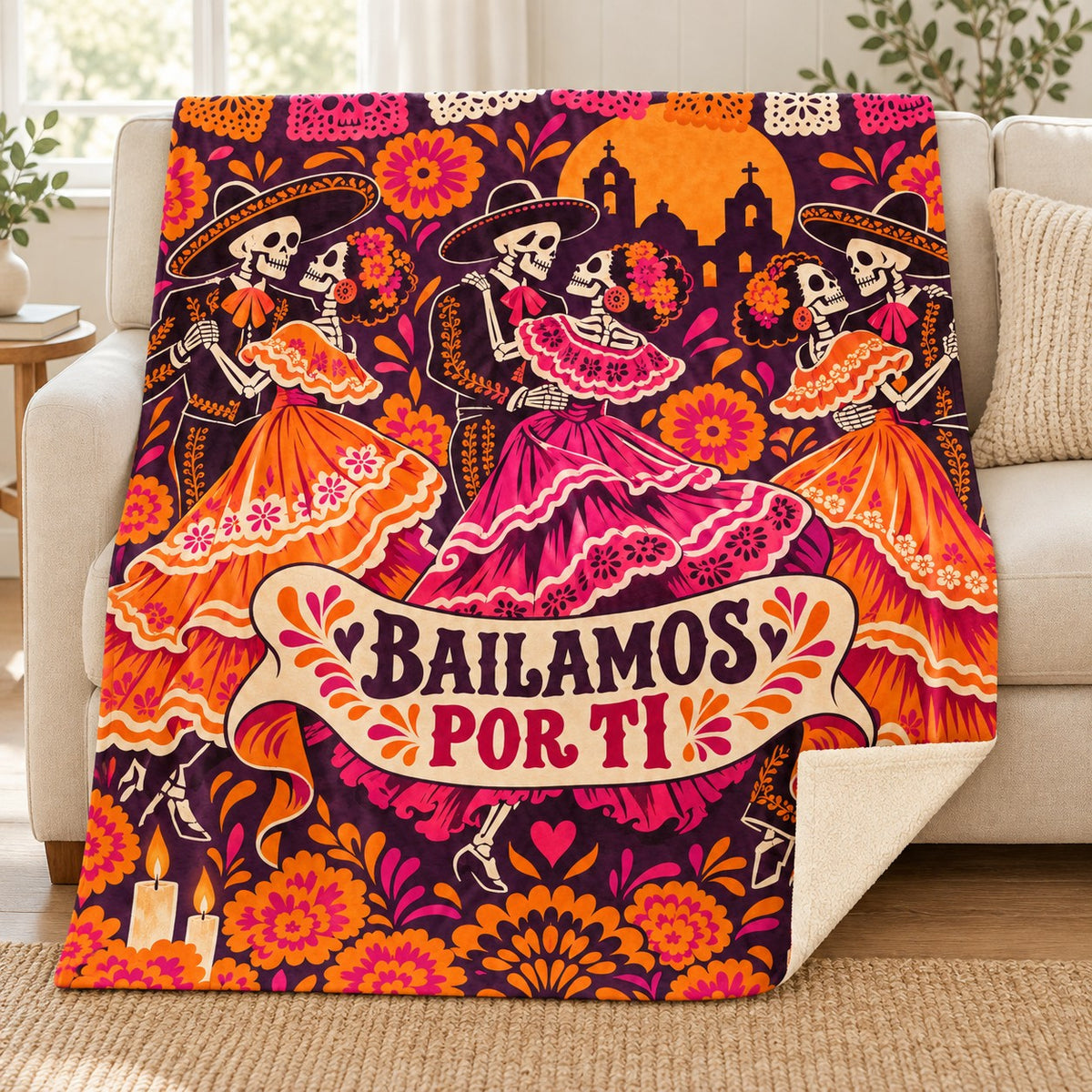 Bailamos por Ti blanket, on a sofa