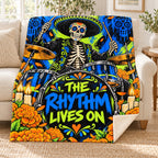 The Rhythm Lives On blanket, on a sofa