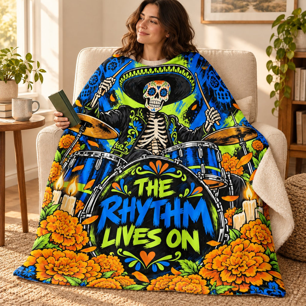 The Rhythm Lives On blanket, wrapped around a reader