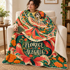 Florece la Alegría blanket, wrapped around a reader