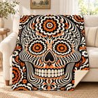 Op-Art Calavera blanket, on a sofa