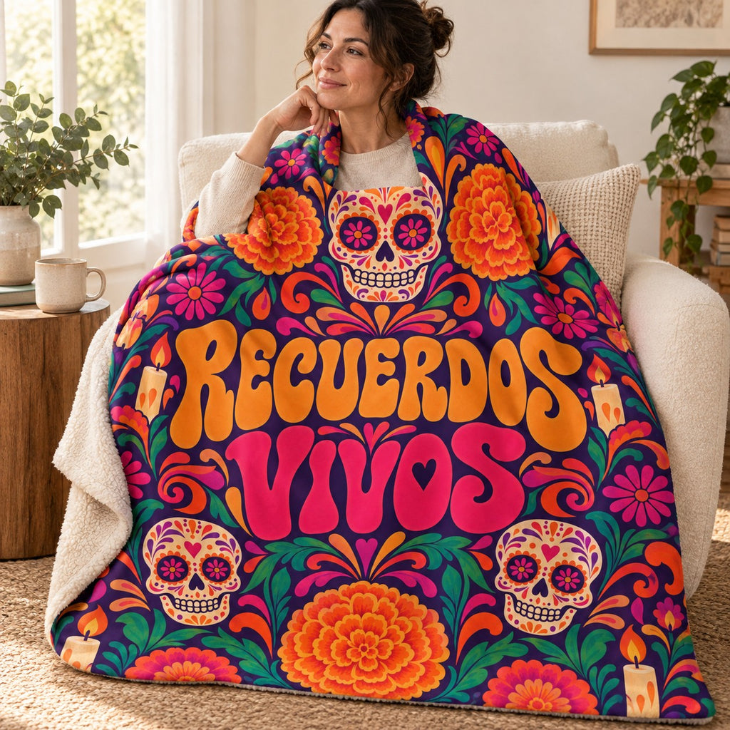 Recuerdos Vivos blanket, wrapped around a reader