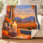Your Light Remains blanket, on a sofa