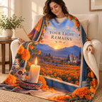 Your Light Remains blanket, wrapped around a reader