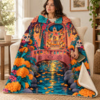 Papel Picado Bridge blanket, wrapped around a reader