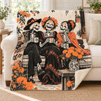 Three Friends blanket, on a sofa