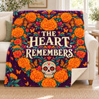 The Heart Remembers blanket, on a sofa