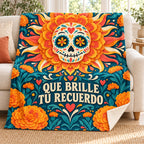Que Brille Tu Recuerdo blanket, on a sofa