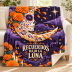 Recuerdos Bajo la Luna blanket, on a sofa