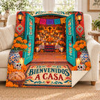 Bienvenidos a Casa blanket, on a sofa