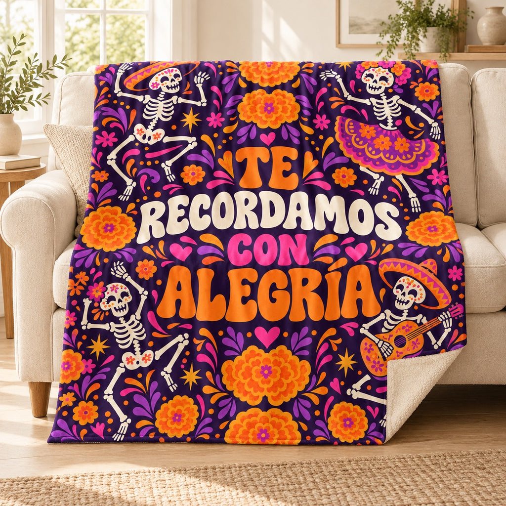 Te Recordamos con Alegría blanket, on a sofa