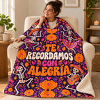 Te Recordamos con Alegría blanket, wrapped around a reader