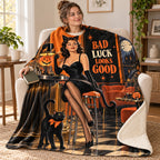 Black Cat Club blanket, wrapped around a reader