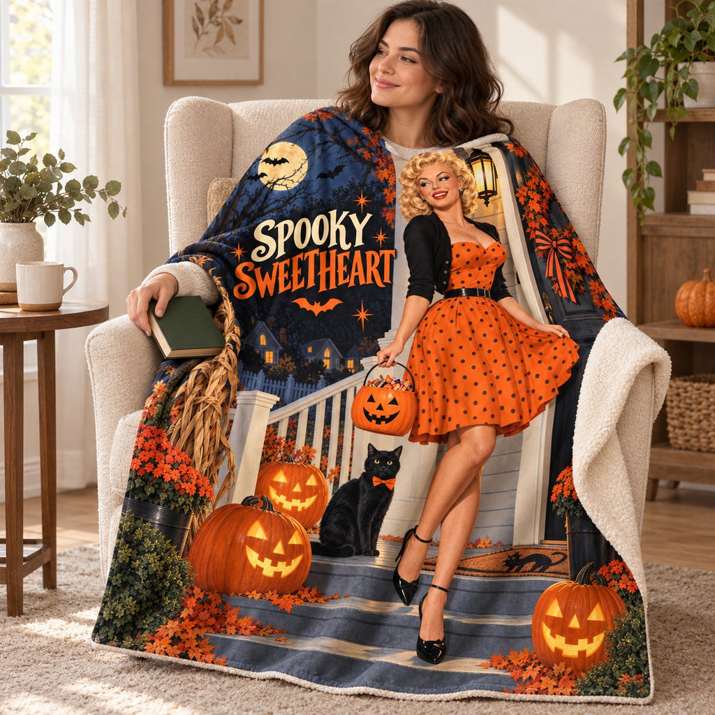 Spooky Sweetheart blanket, wrapped around a reader