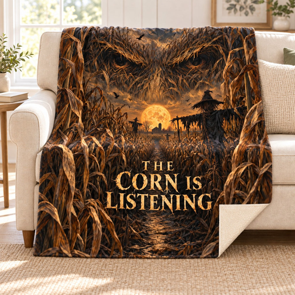 Cornfield Whispers blanket, on a sofa