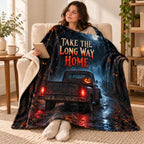 Midnight Drive blanket, wrapped around a reader