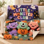 Little Monsters blanket, on a sofa