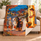 Porchlight Parade blanket, on a sofa