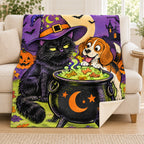 Cat and the Cauldron blanket, on a sofa