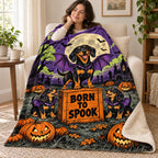 Bat Dog Flight School blanket, wrapped around a reader