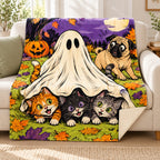 Ghost Kitten Ambush blanket, on a sofa