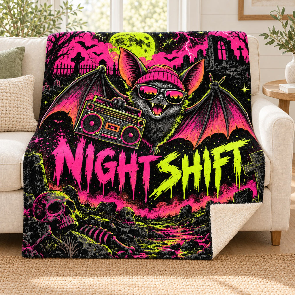 Bat Boombox Beat blanket, on a sofa