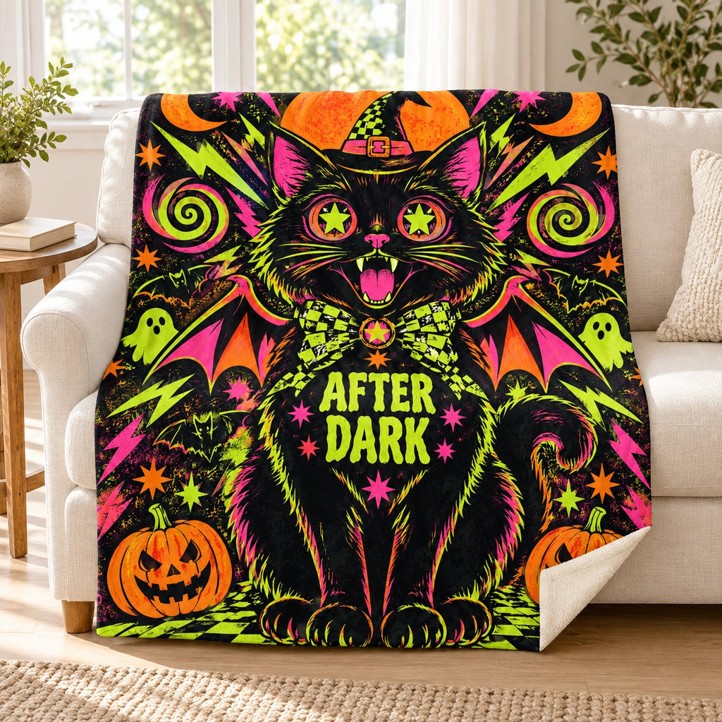 Midnight Cat Energy blanket, on a sofa