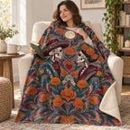 Two Hearts One Garden blanket, wrapped around a reader