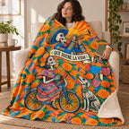 Trumpet at Dawn blanket, wrapped around a reader