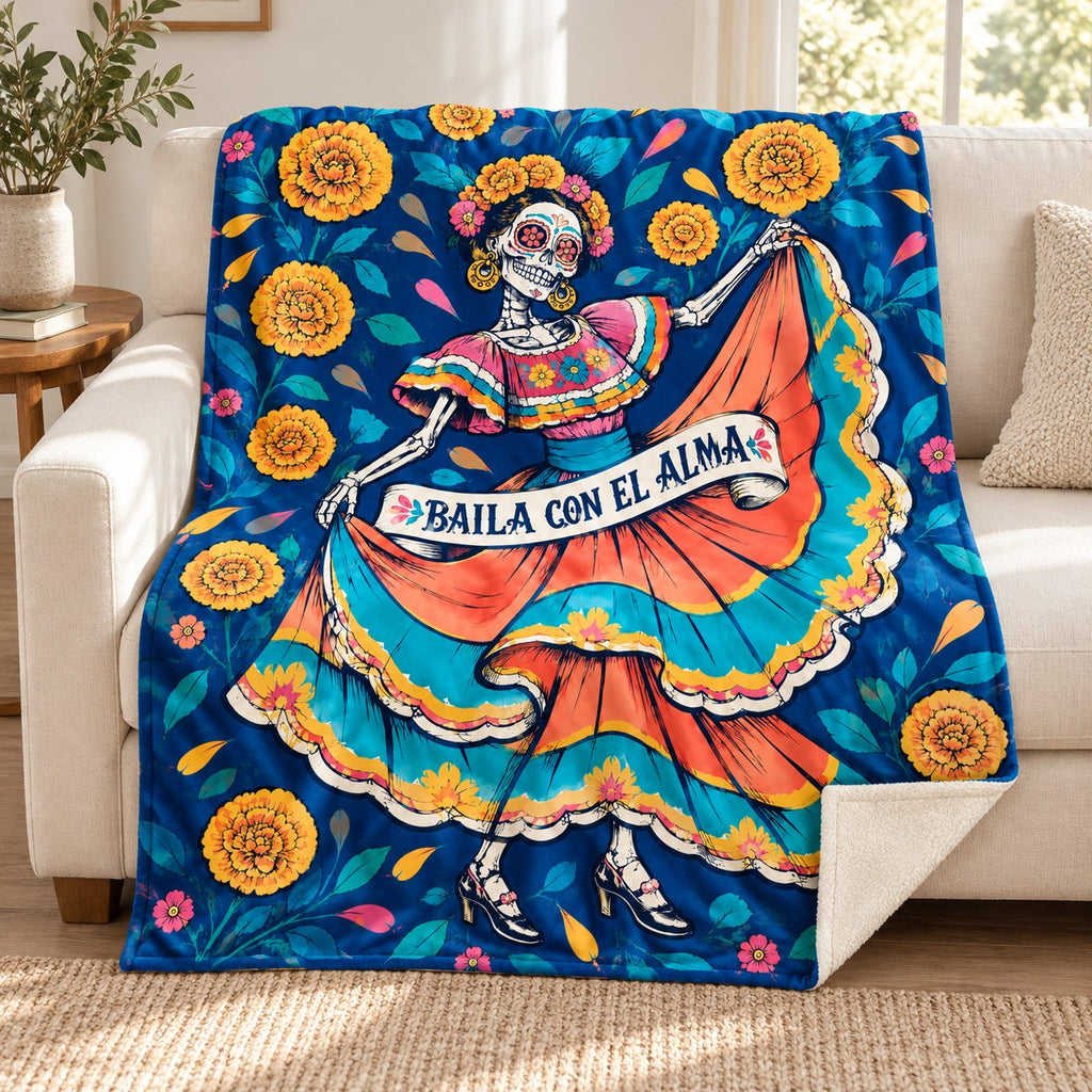 Folklorico Whirl blanket, on a sofa