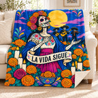 The Plaza Singer blanket, on a sofa