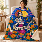 The Plaza Singer blanket, wrapped around a reader
