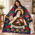 Santa Teresita blanket, wrapped around a reader