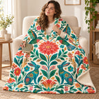 Colibries del amanecer blanket, wrapped around a reader