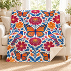 Jardin de mariposas blanket, on a sofa
