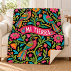 Aves de mi tierra blanket, on a sofa